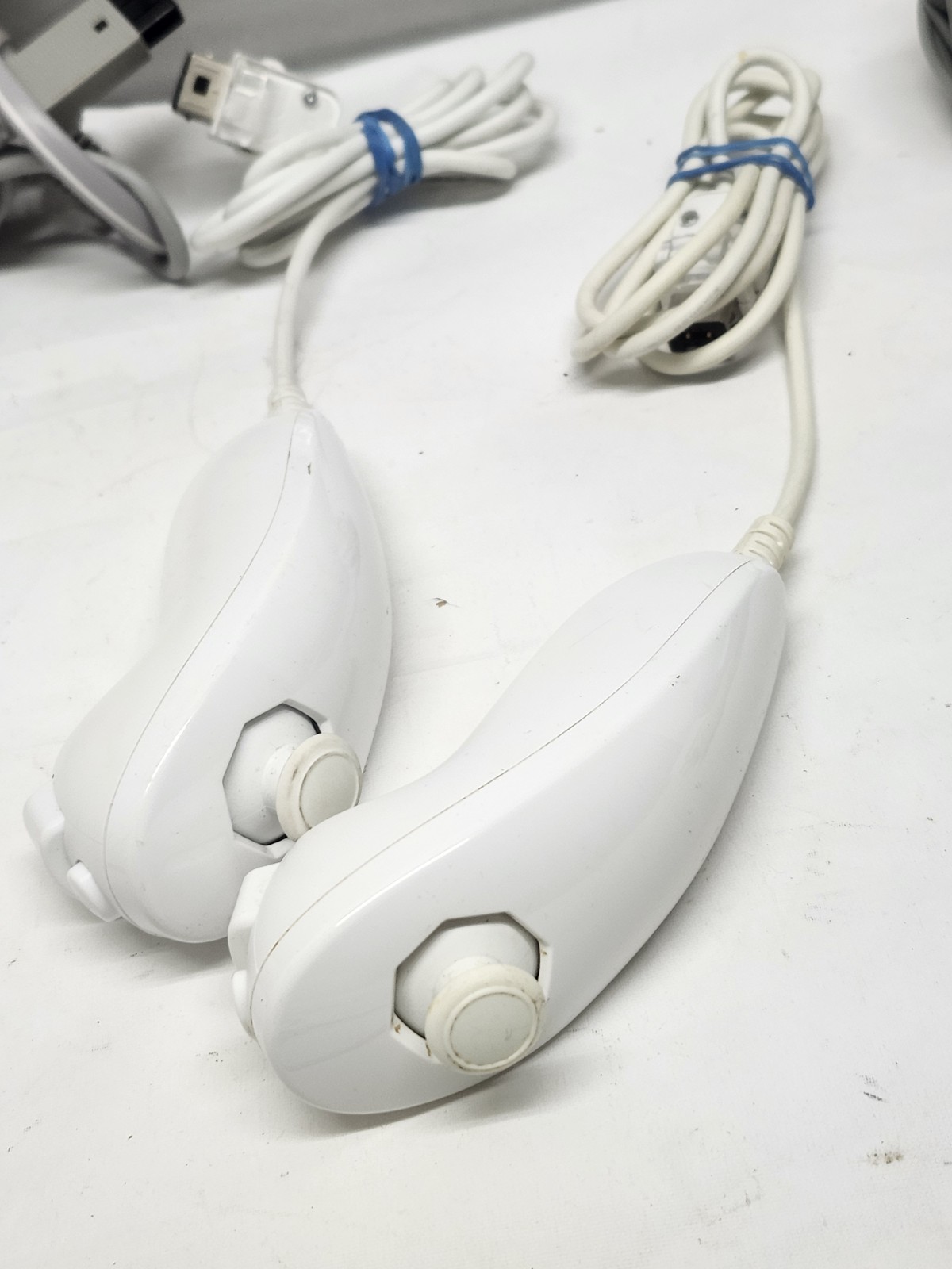 Nintendo Wii Console Bundle (2) Controllers, Motion Plus, Game Nunchuck, & Cords