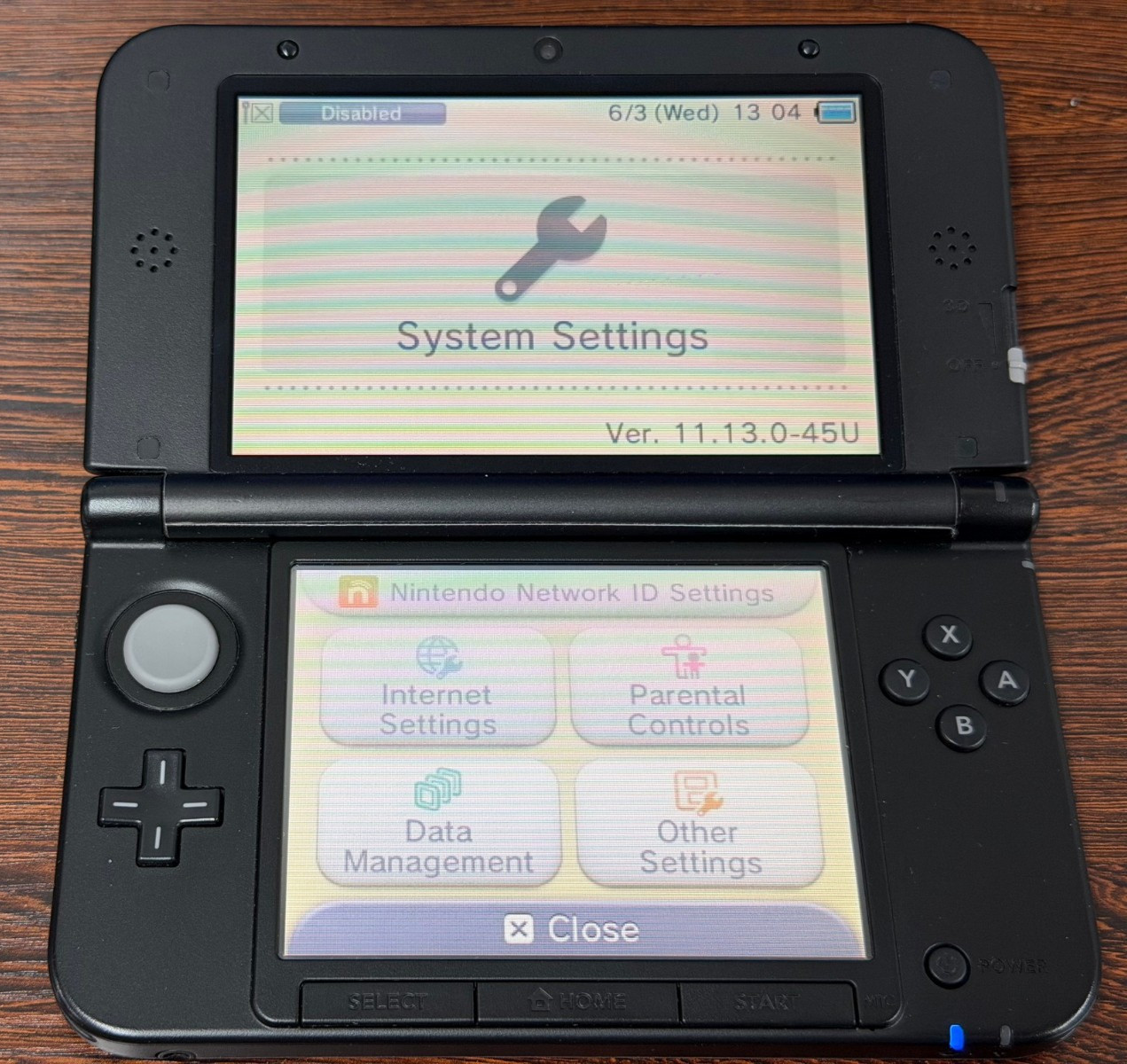 Nintendo 3DS XL Handheld Console – Black and Red – Excellent Condition with Skin