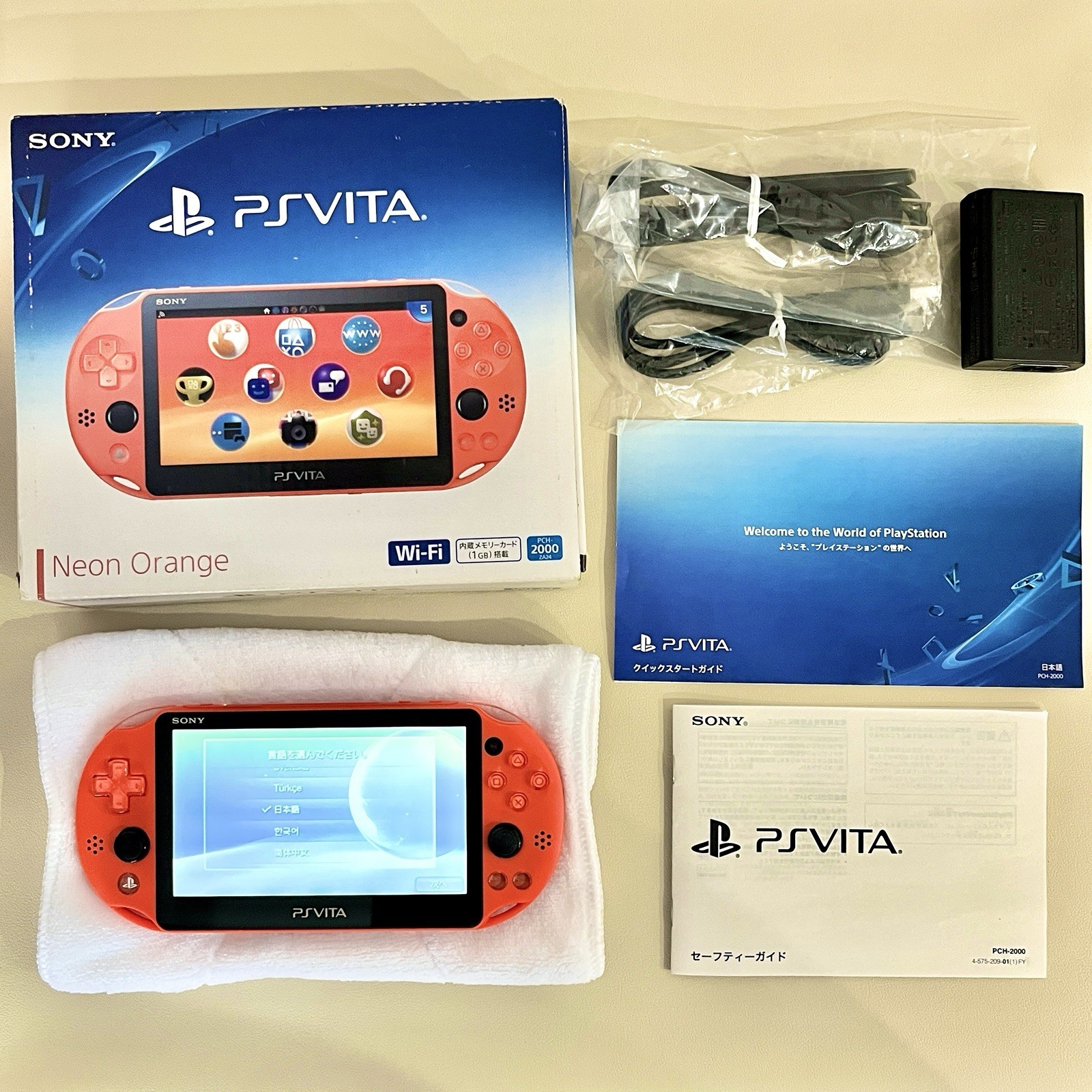 Sony PS Vita PCH-2000 Neon orange with Box + Japanese Import FW 3.68 – SD Adapt
