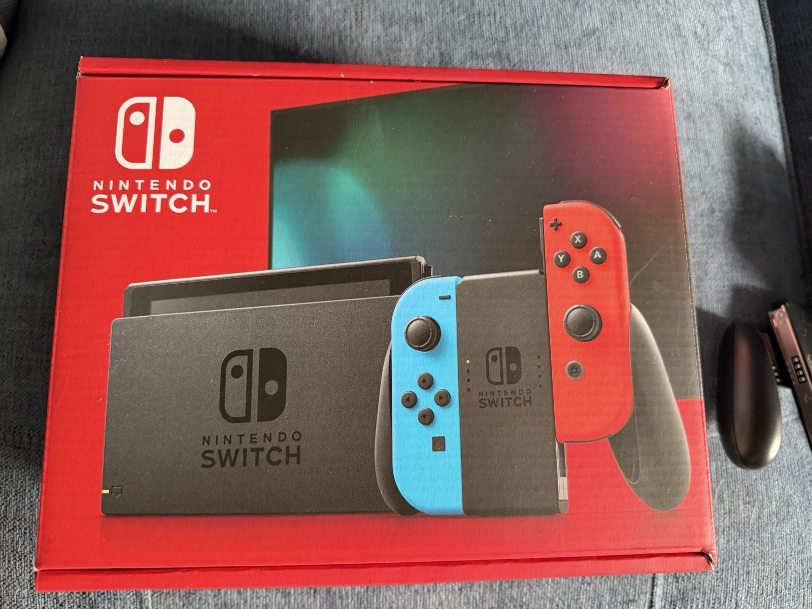 Nintendo Switch Bundle with Neon Blue and Neon Red Joy-Con (HAC-001-01)