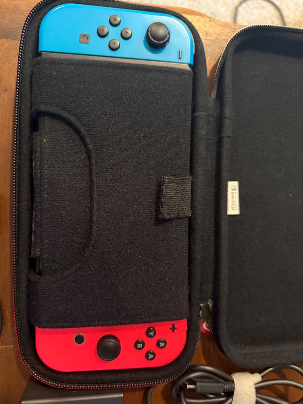Nintendo Switch 32GB Handheld Console – Neon Red/Neon Blue