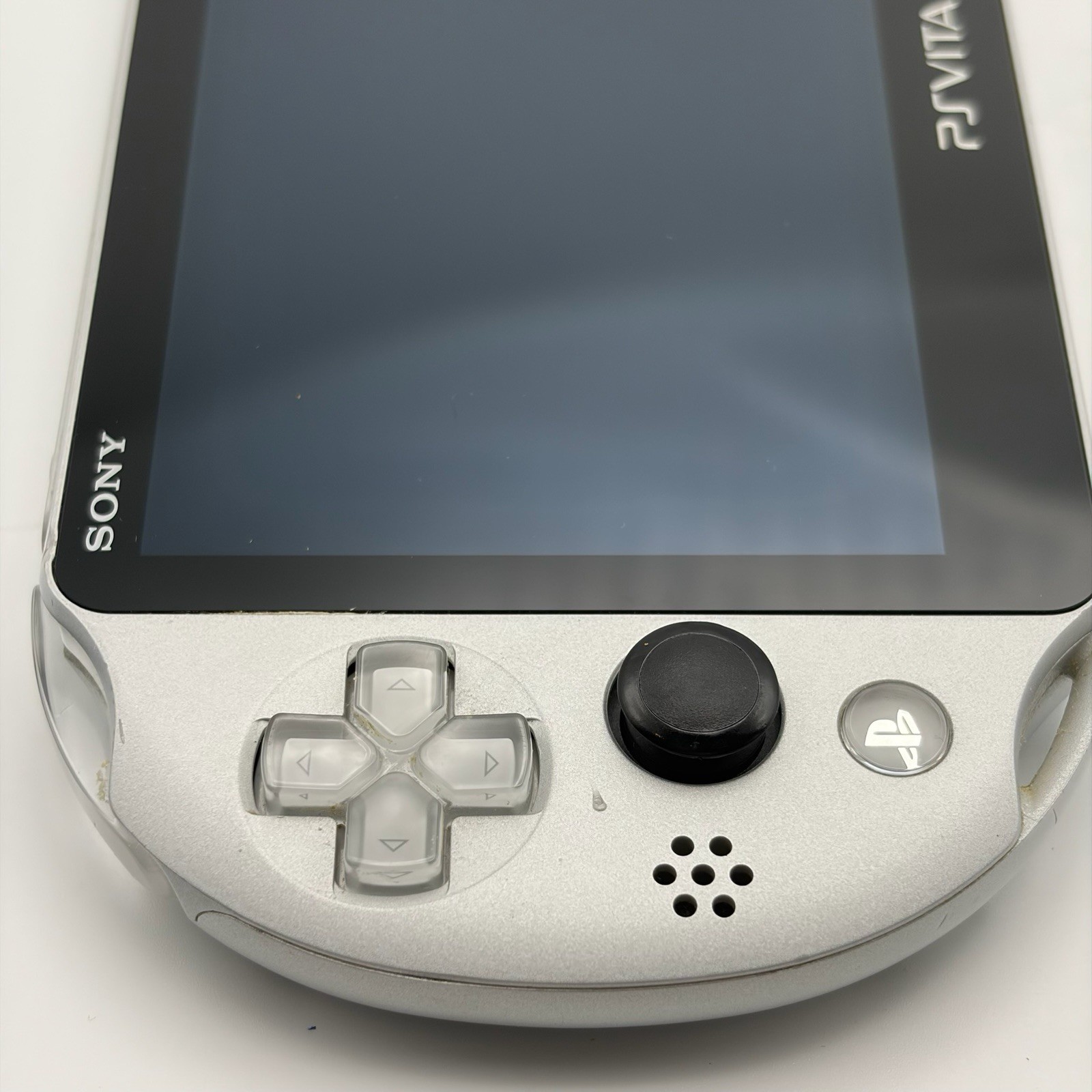 SONY PS Vita PCH-2000 Console Silver Very Good Fast Shipping No joystick drift.