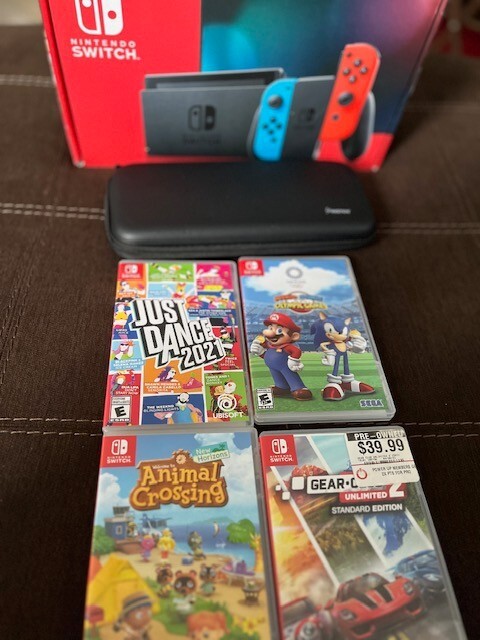 Nintendo Switch – Neon Blue/Red Joy-Con…and games