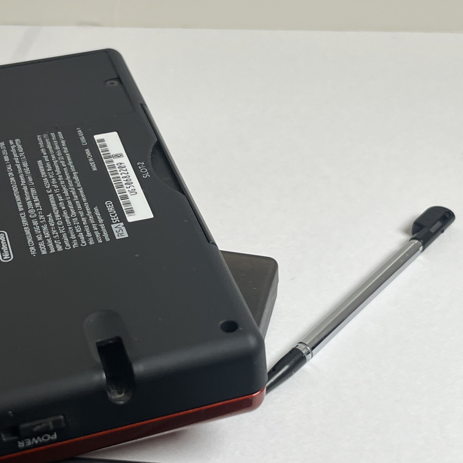 Nintendo DS Lite in Maroon with DS Lite With 5 Games