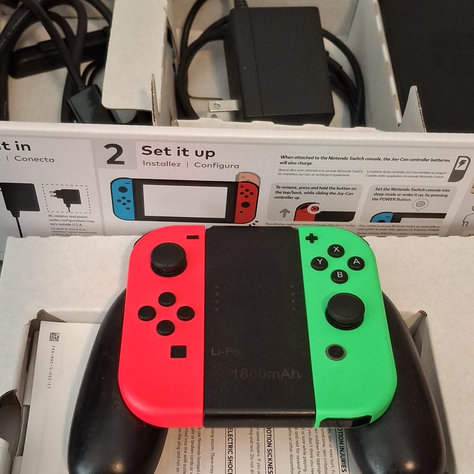 Nintendo Switch Hybrid Console Bundle Neon Red/Green Joy-Con + Charging Grip