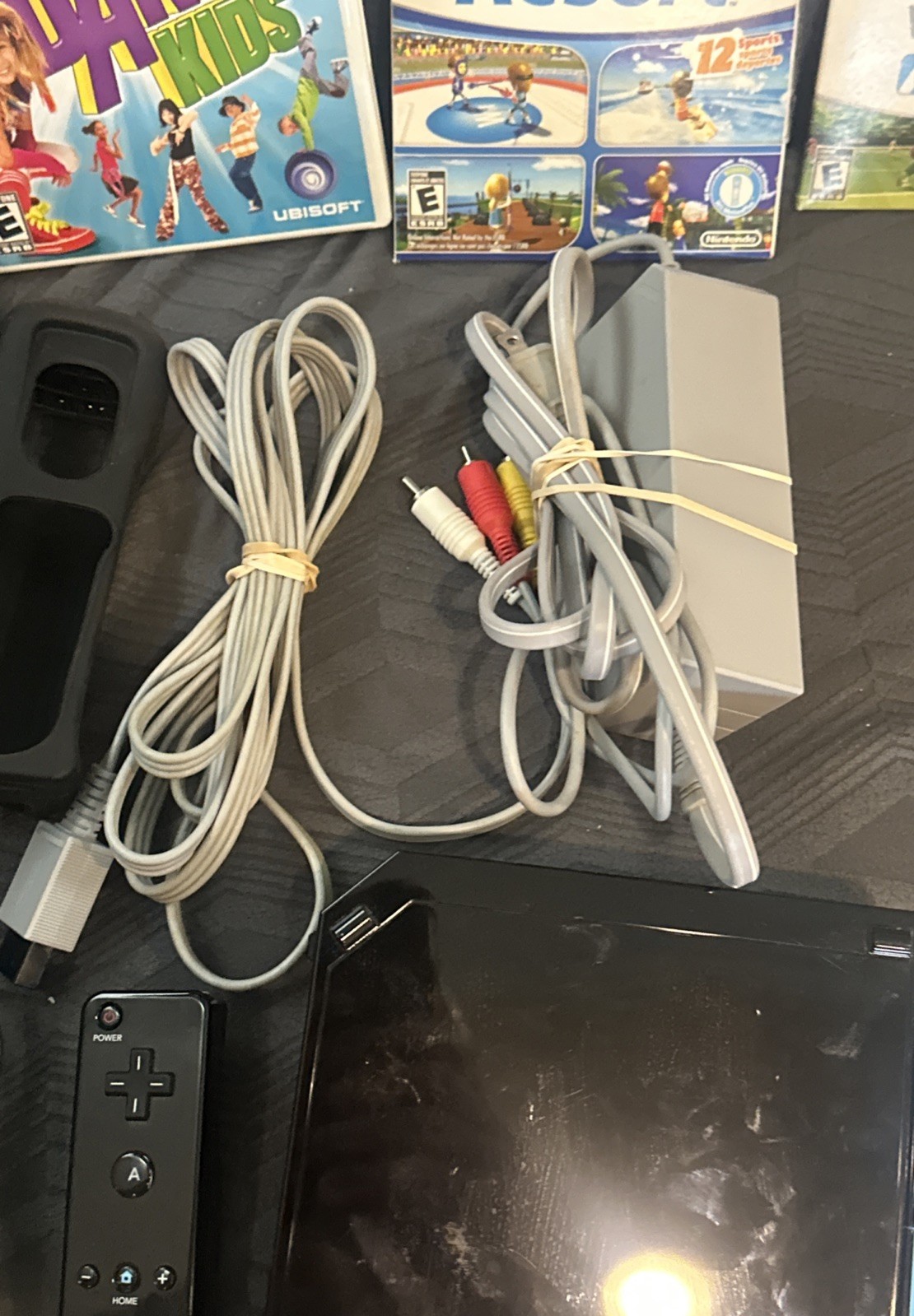 Nintendo Wii Black Console Bundle with Wii Sports & Resort Tested Bonus Items