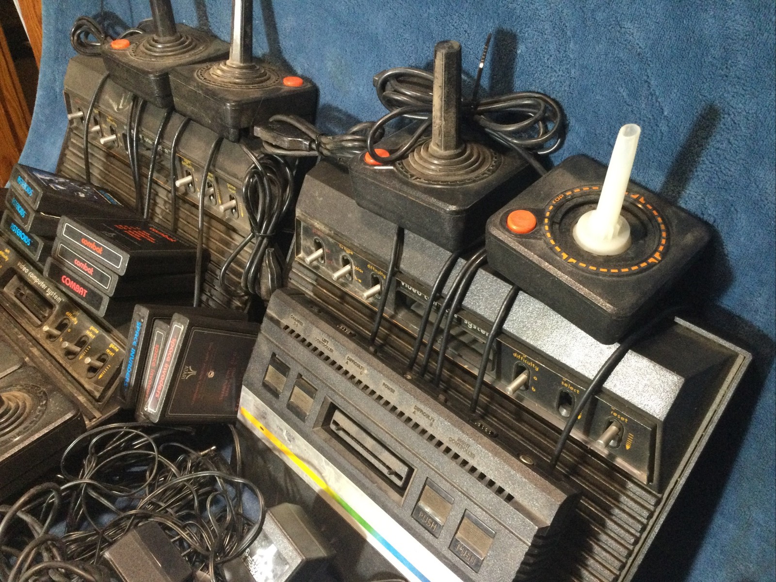 LOT(4) ATARI 2600 CONSOLES (42)GAMES (21)CONTROLLERS (4)AC ADAPTERS UNTESTED!!