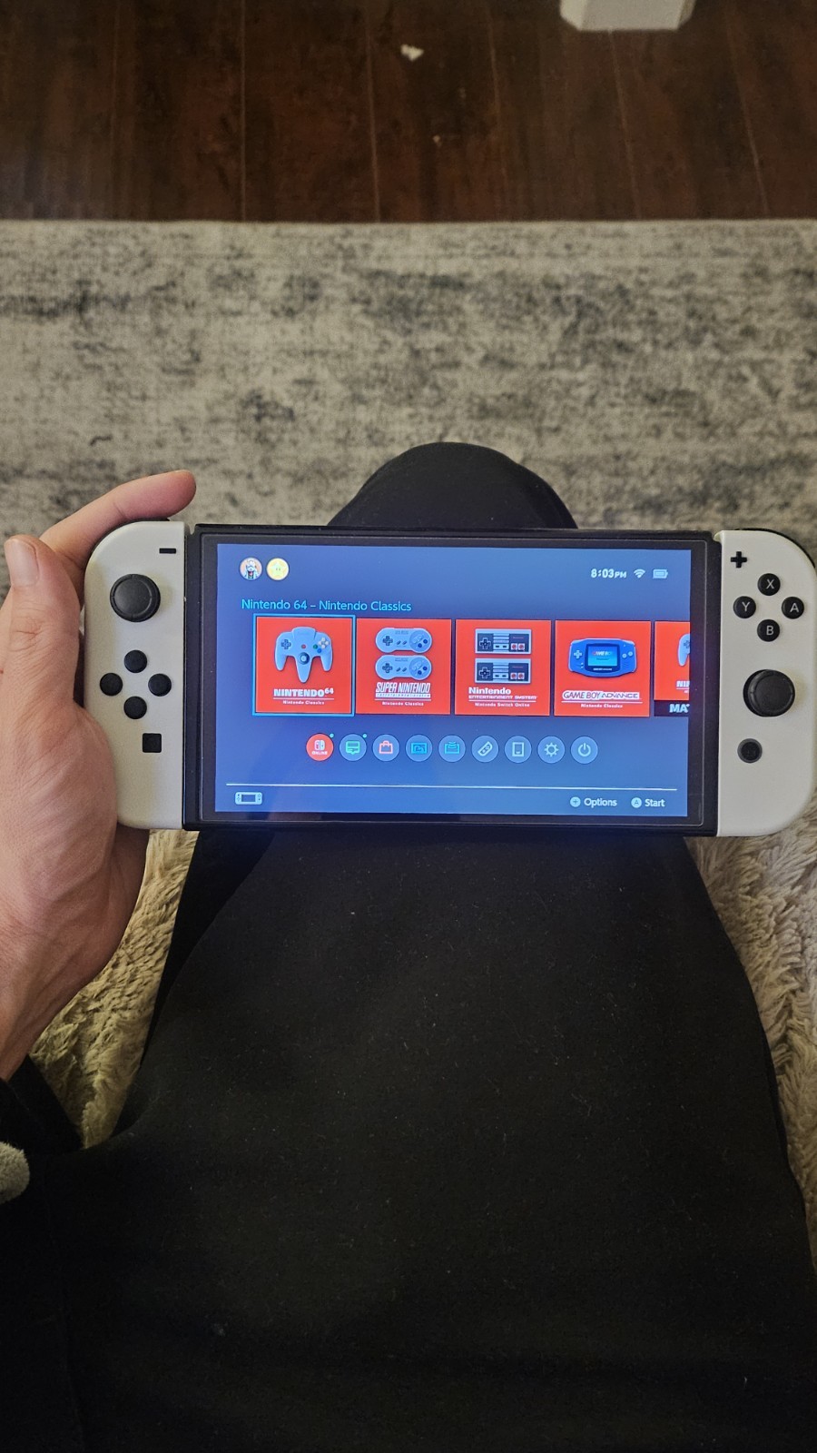 Nintendo Switch White OLED 64GB Handheld Console with Controller