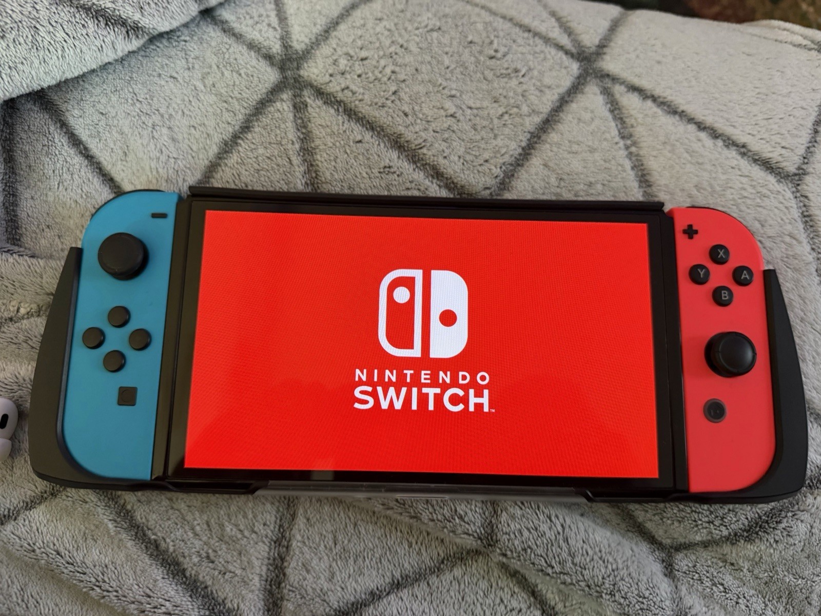 Nintendo Switch OLED 64GB Neon Blue/Red | Bundled w/ Grip Case & Carrying Case