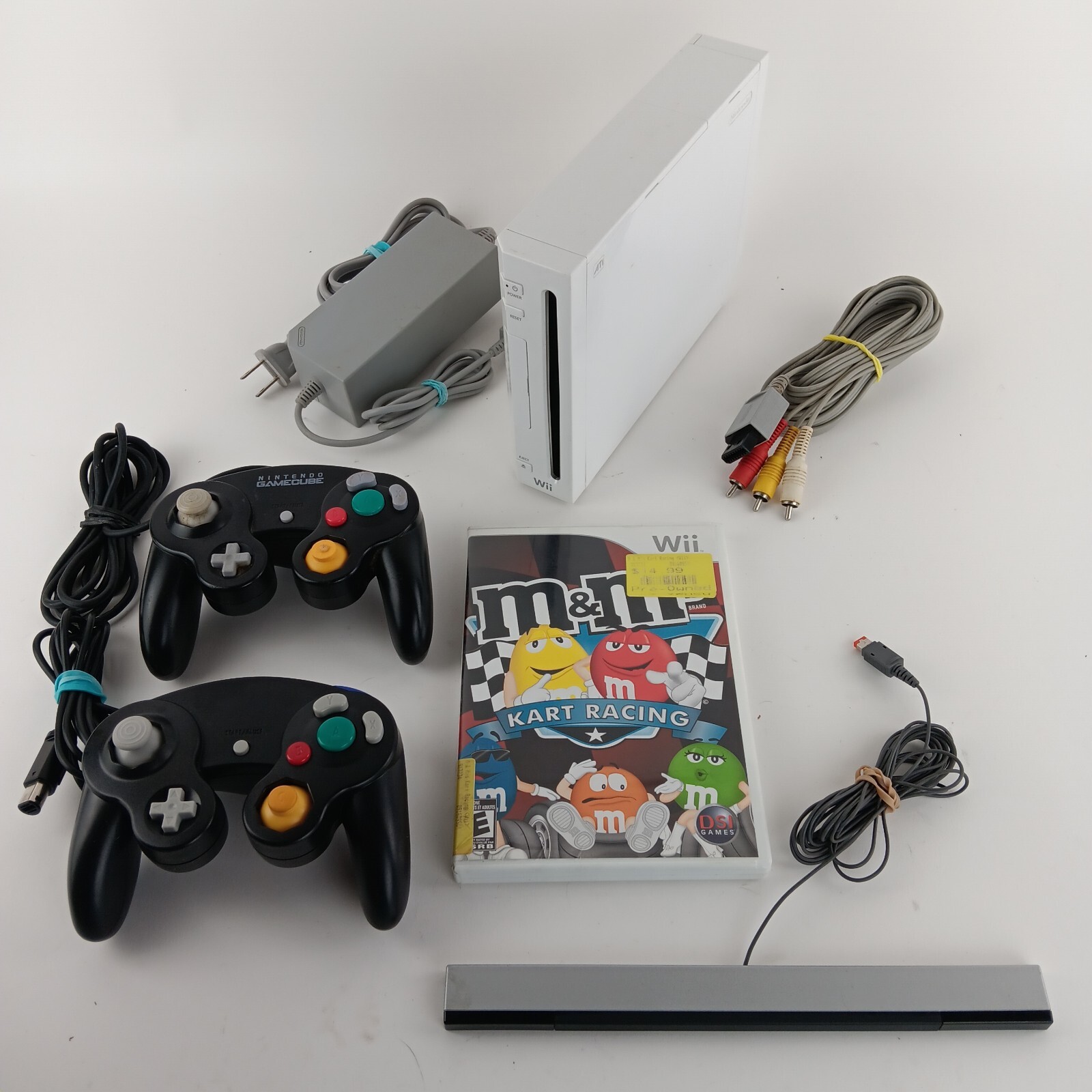 Wii Bundle 2 Game Cube Controlers, M&M Cart Racing. Worn Pad On 1 Right Toggle,