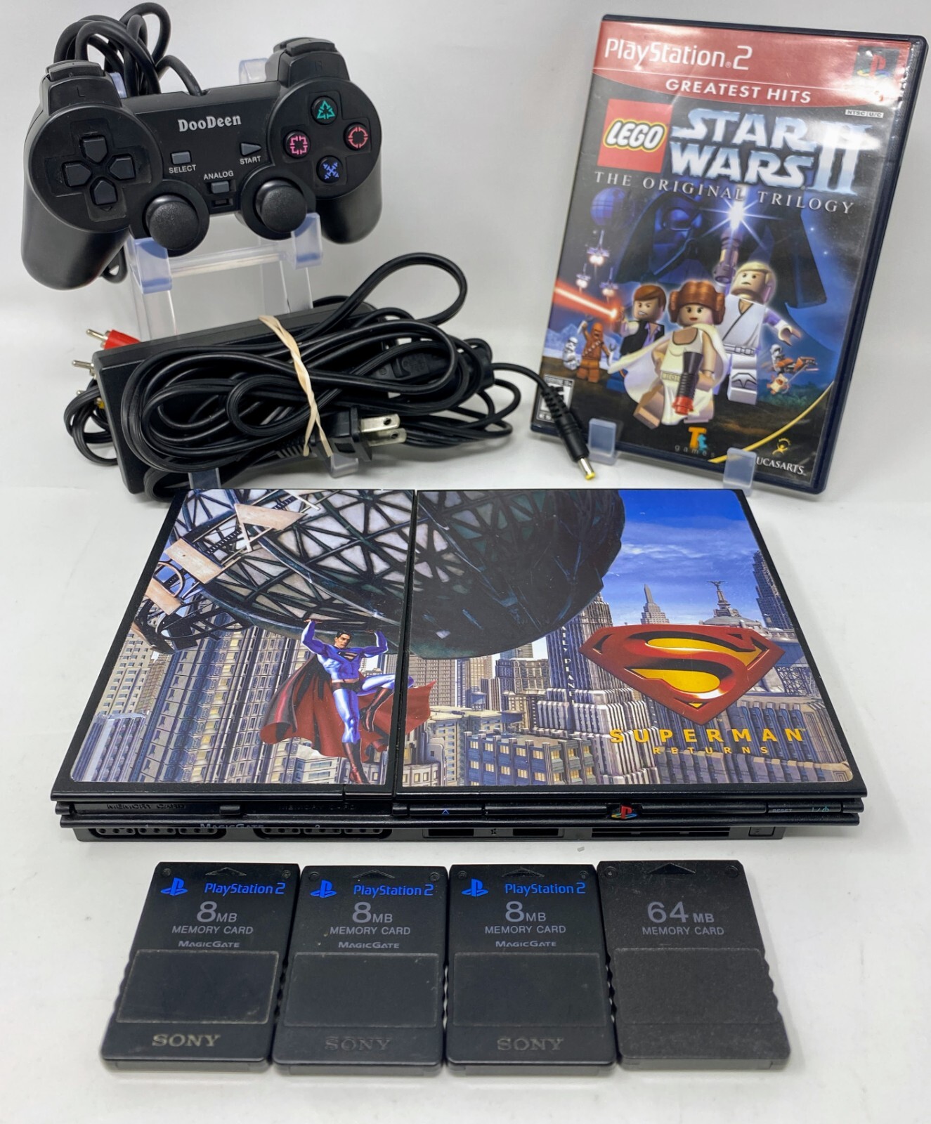 Sony PlayStation 2 Slim – Includes 4 Memory Cards, Controller, & Game – TESTED