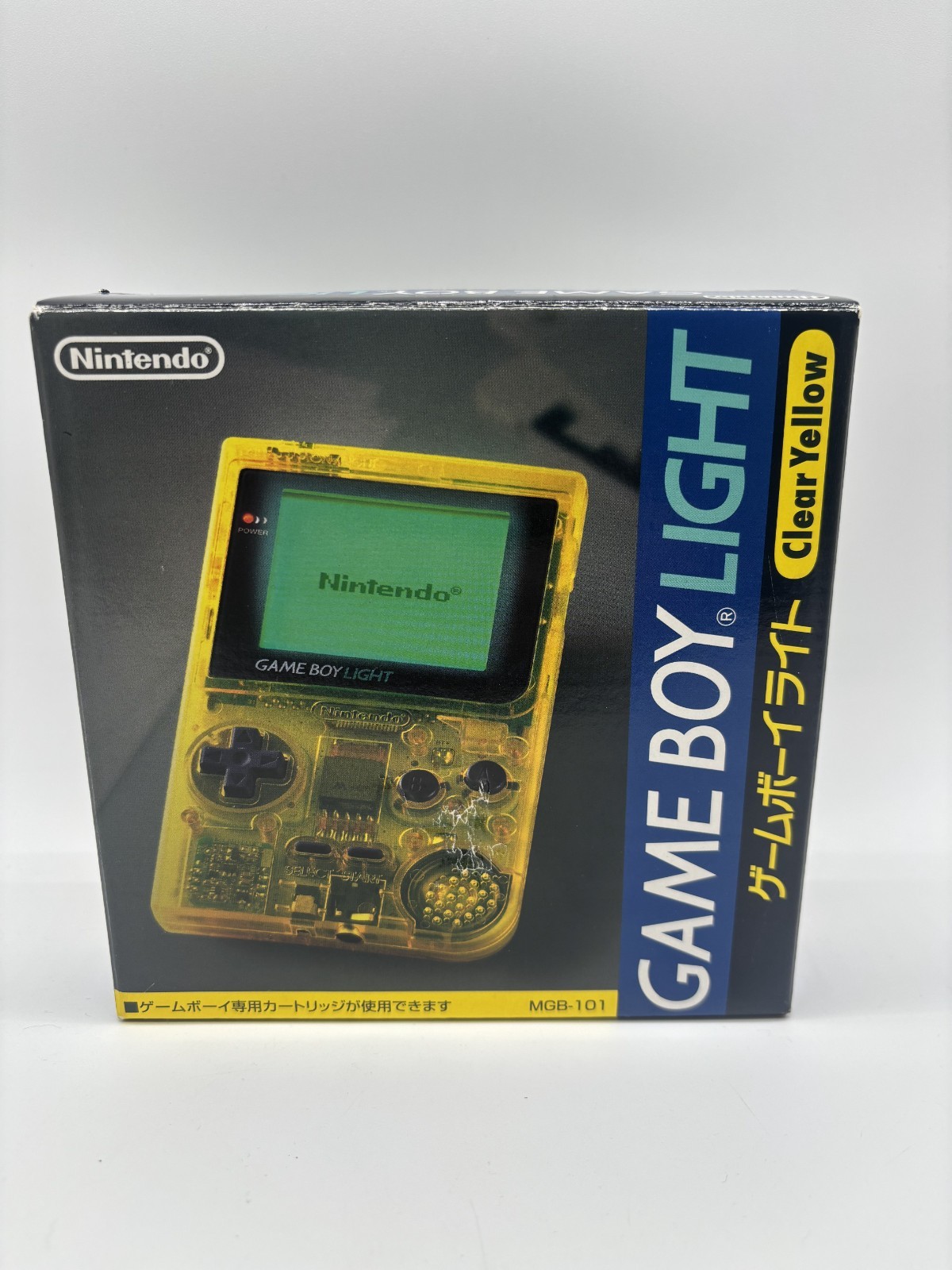 gameboy light toys r us Clear Yellow Tested JP – Dent on box Front CIB – RARE!