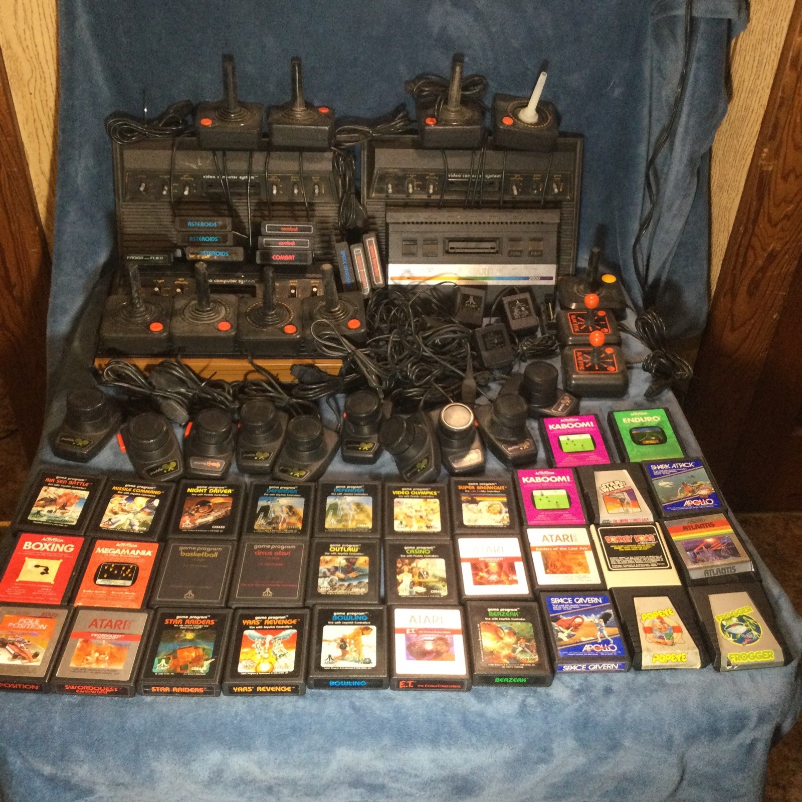 LOT(4) ATARI 2600 CONSOLES (42)GAMES (21)CONTROLLERS (4)AC ADAPTERS UNTESTED!!