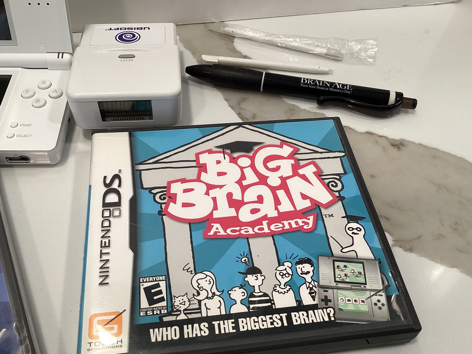 Nintendo DS Lite Polar White some light scratches, 2 styluses, & charger + Games