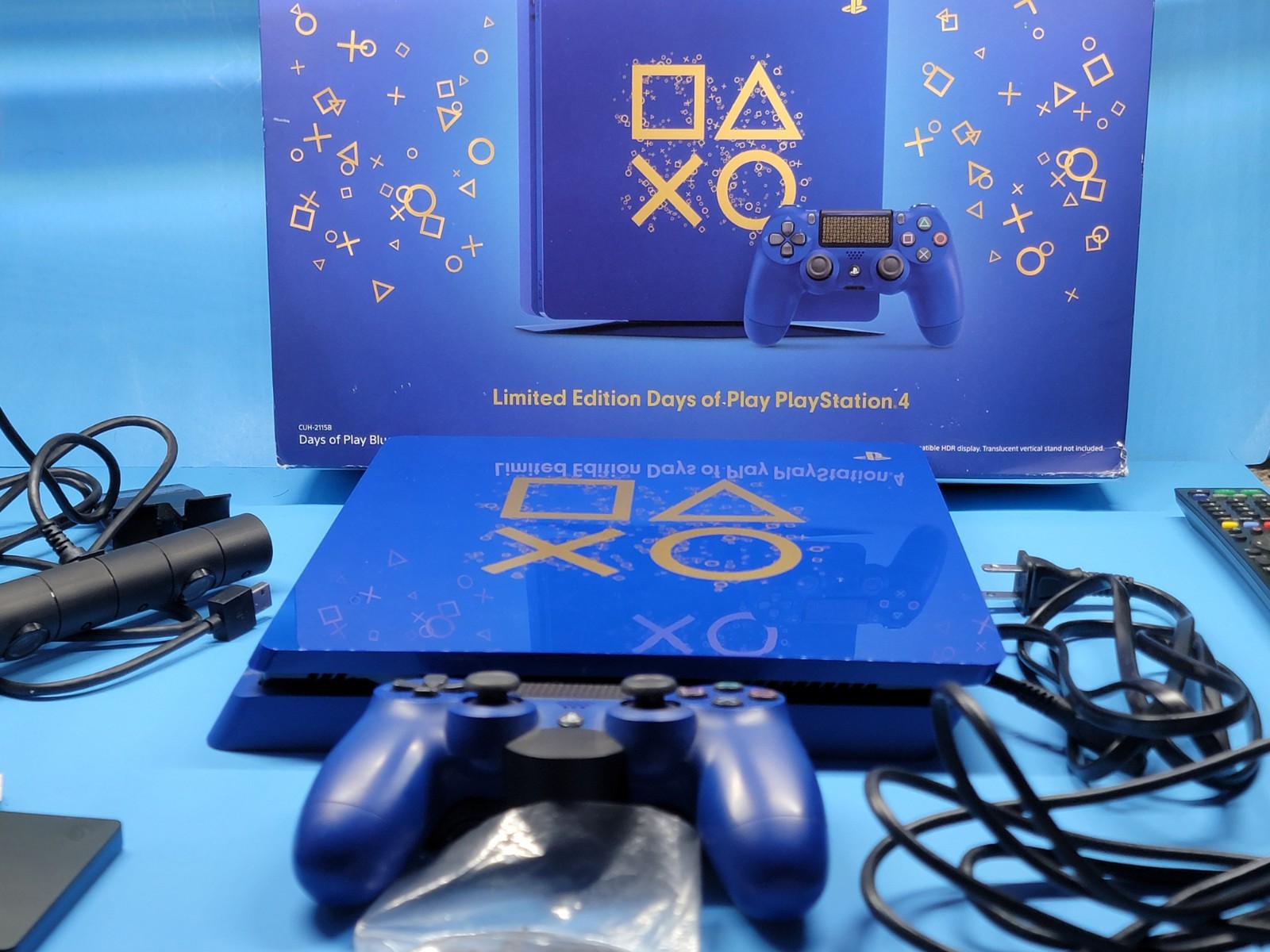 Sony PlayStation 4 Days of Play Blue 1TB Media Remote Camera & External HD