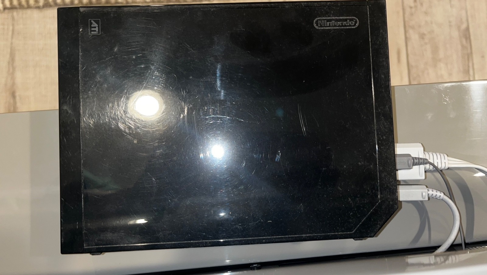 Nintendo Wii mini console (used), 2 controllers, and Nintendo Mario Kart Wheel