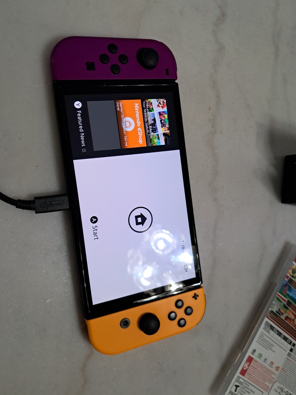 Nintendo Switch OLED Bundle + Dragon Ball Z: Kakarot ​
