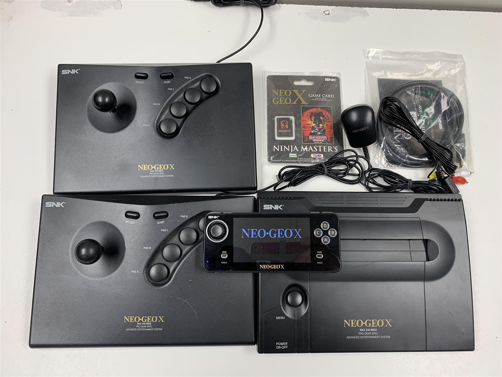 SNK Neo Geo X Gold Limited Edition Bundle – 2 Arcade Sticks & Ninja Master’s NM