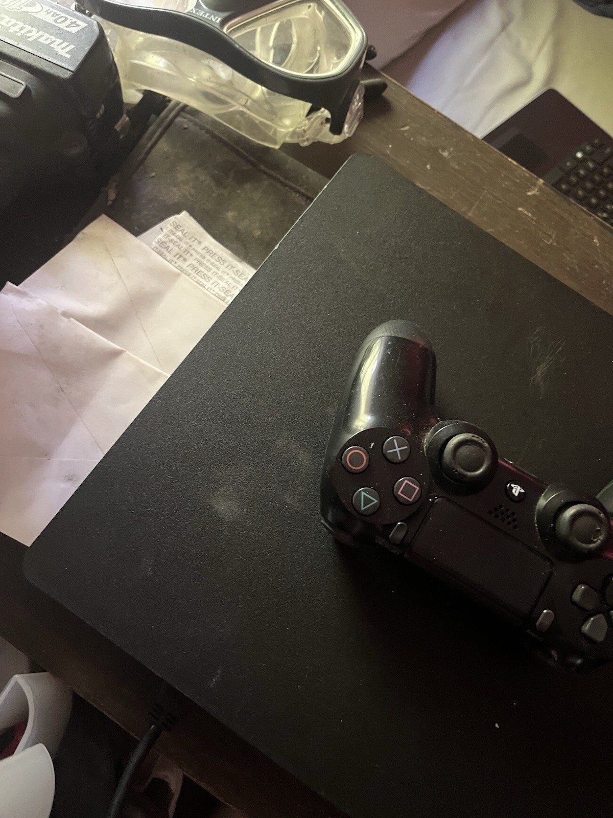 Black PlayStation 4 With One Controller A 10 Ft HDMI Cord And A Mortal Combat Cd