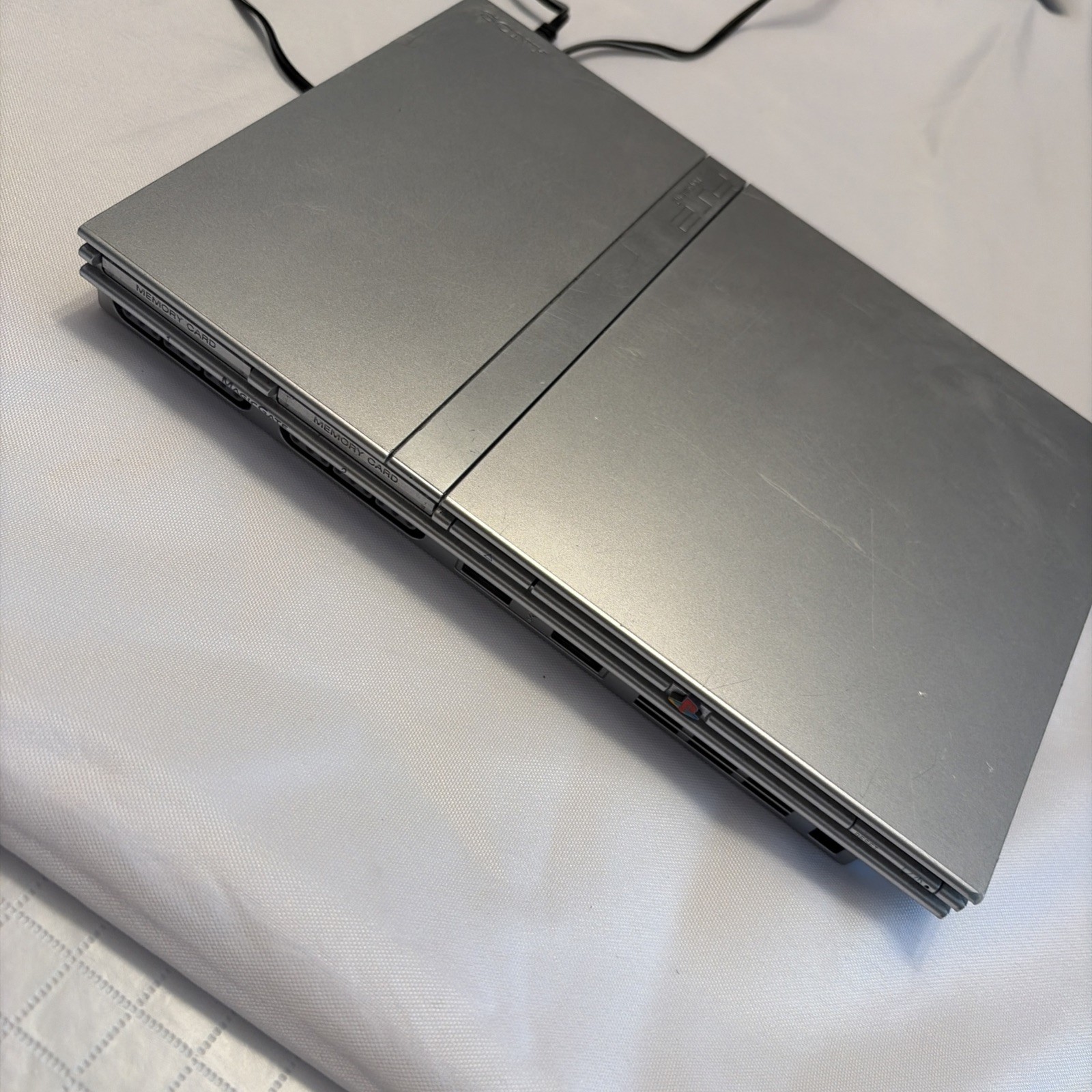 Sony PlayStation 2 Slim Console – Satin Silver. Working