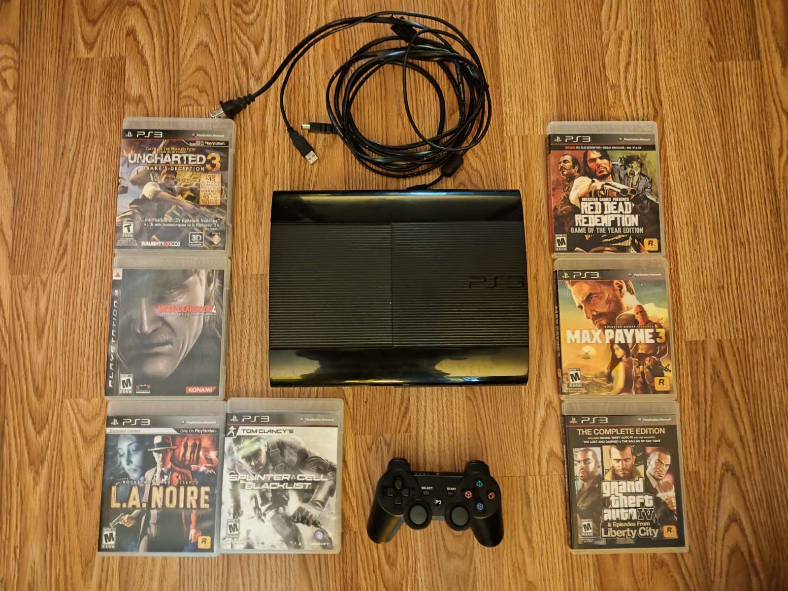 Sony PlayStation 3 Super Slim 500g bundle with seven games and controller