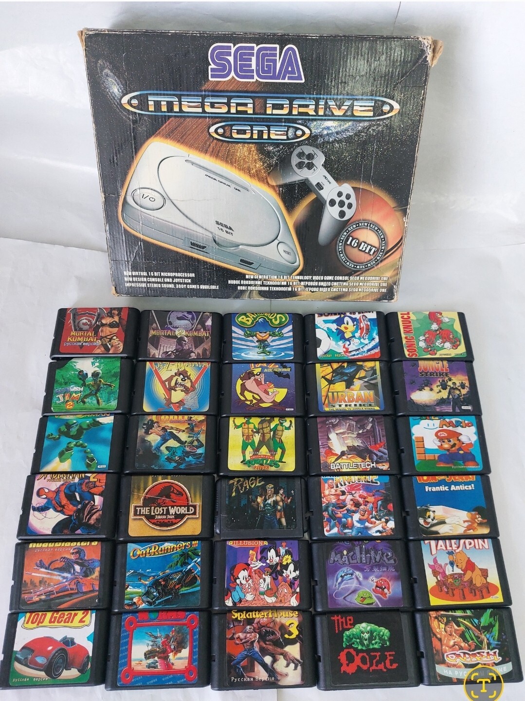 Sega & 30 cartridges from 90’s very good condition full kit box fancy games