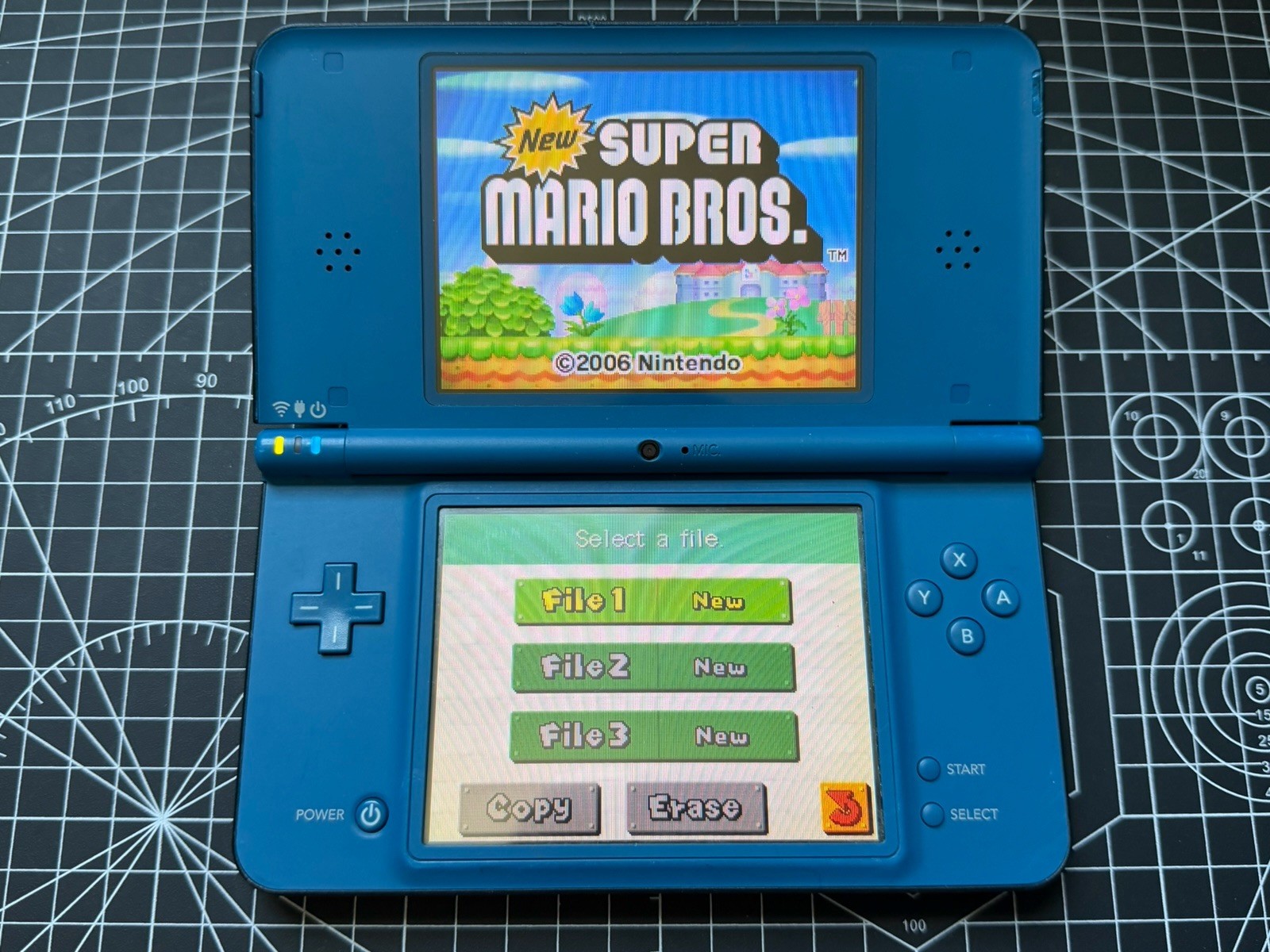 Nintendo DSi XL Blue W/ 2GB SD Card – Run Eng Games 100% Tested *READ DESC
