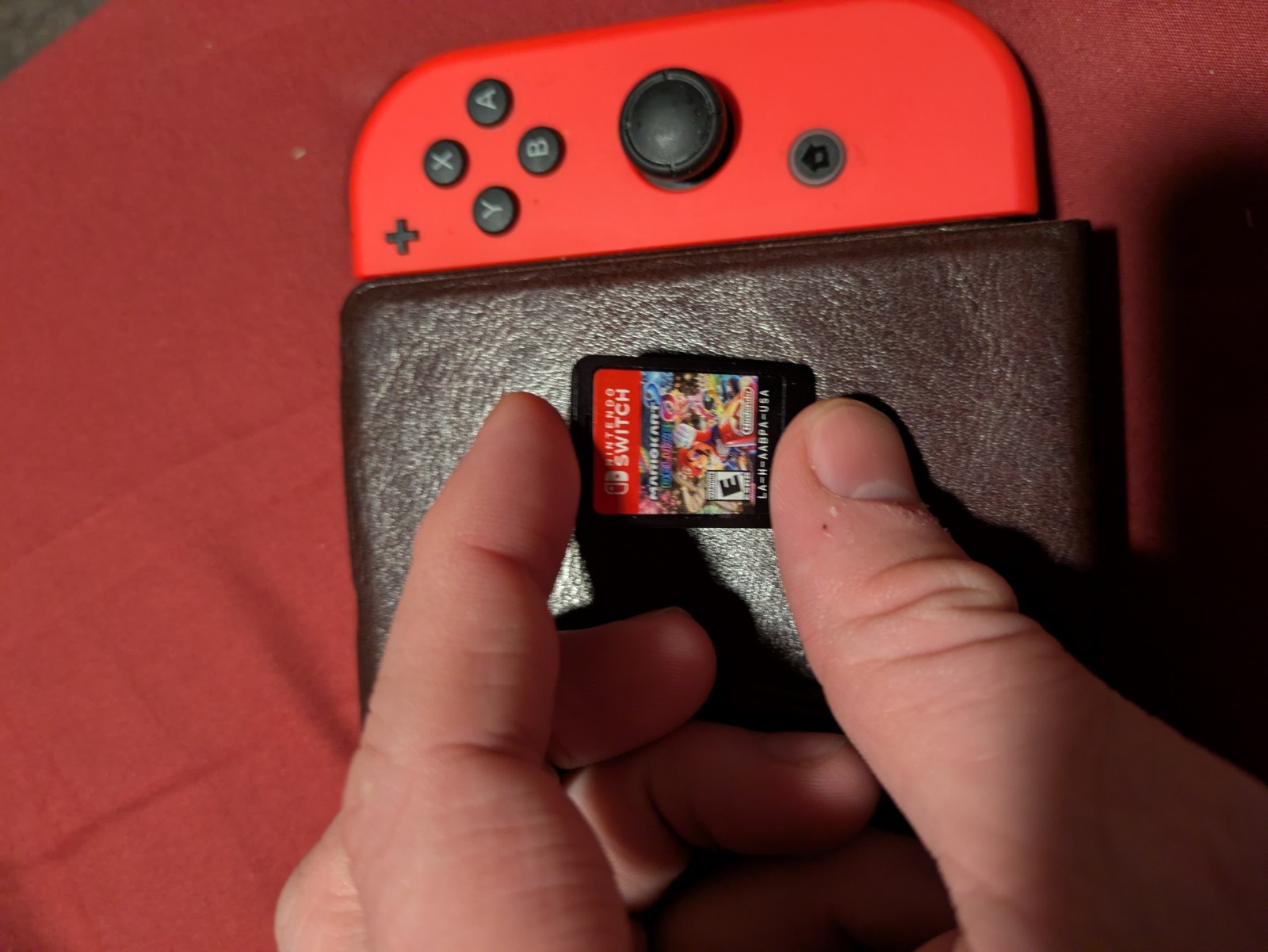 Nintendo Switch OLED Console with Red Blue Joy-Cons and Zelda Carry Case