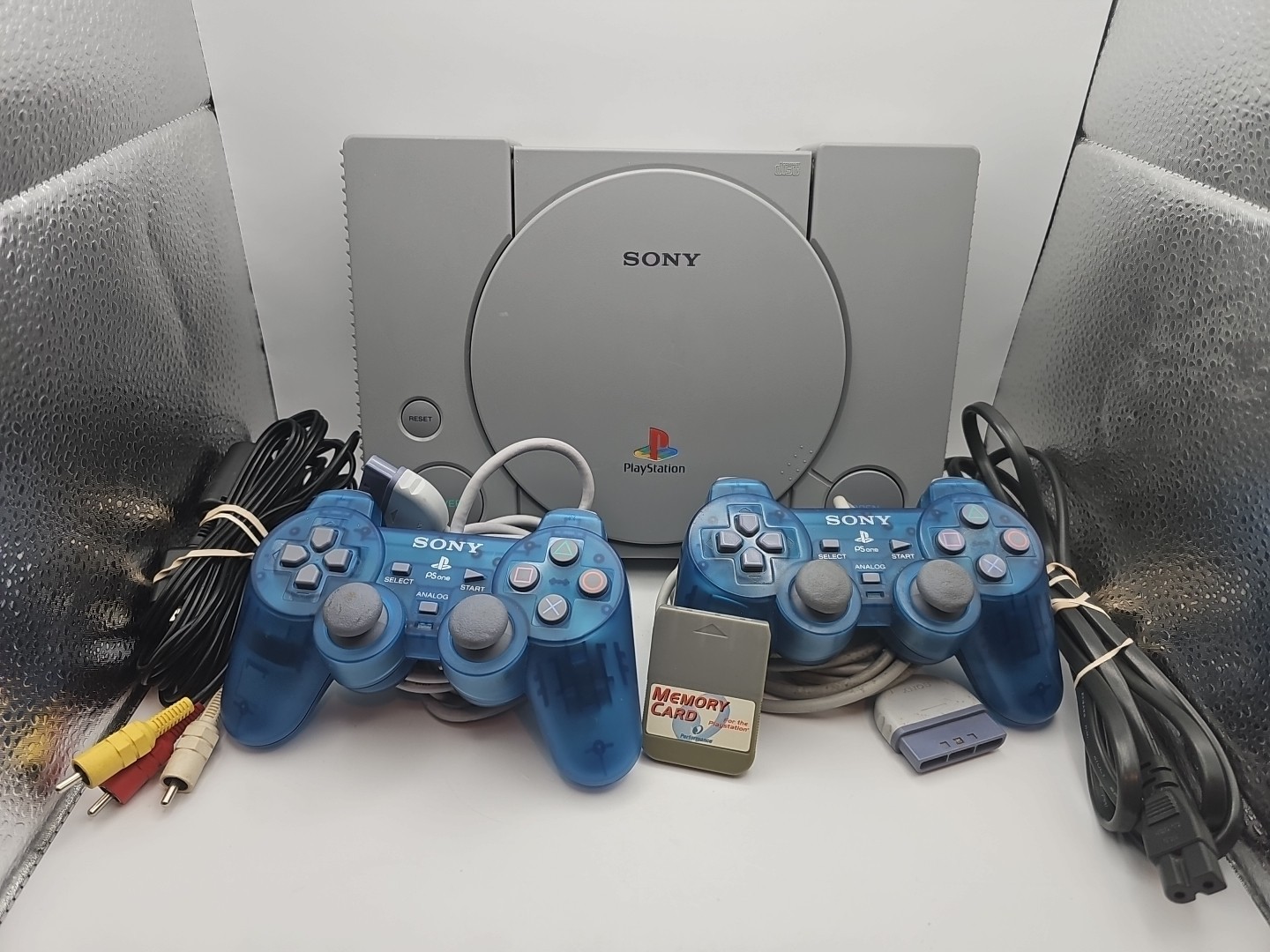 Sony PlayStation Launch Edition Gray Console – W/ 2 Blue Analog Controllers