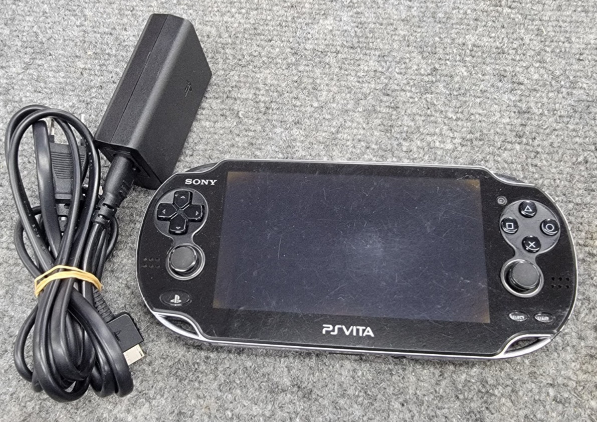 Sony Ps Vita PCH-1100 Crystal Black Model Console And Charger