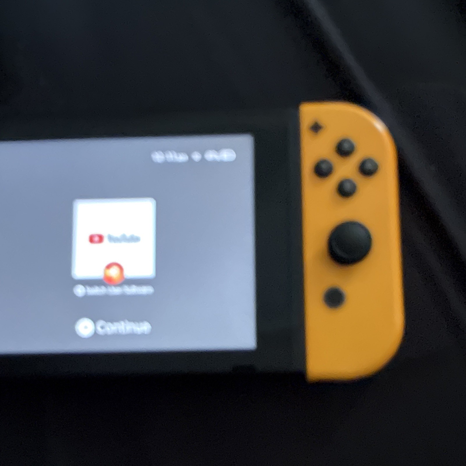 Nintendo Switch Console Black with Purple Left & Yellow Right Joy-Con