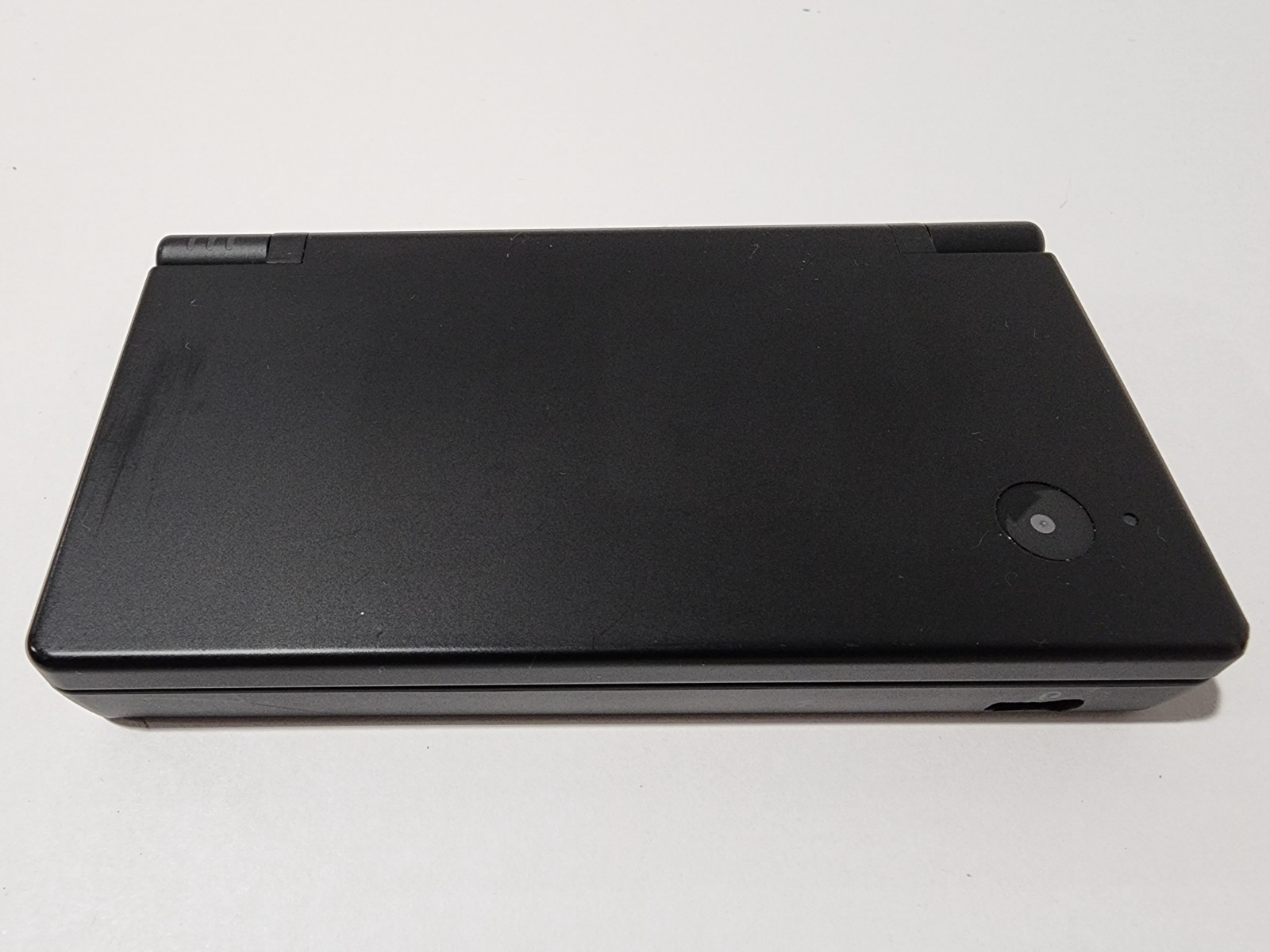 Nintendo DSi Launch Edition Black Handheld System with 7 Games