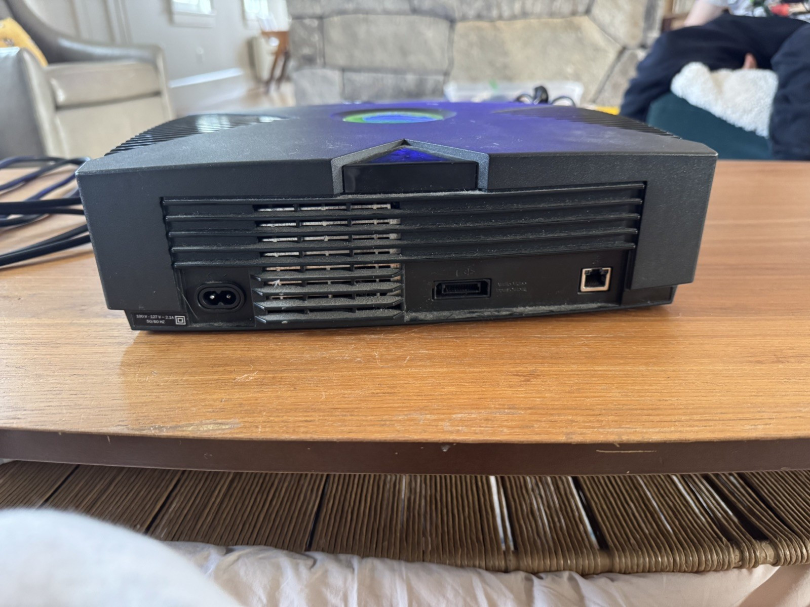 black xbox original consol works connects to tv controllers works fine and cords