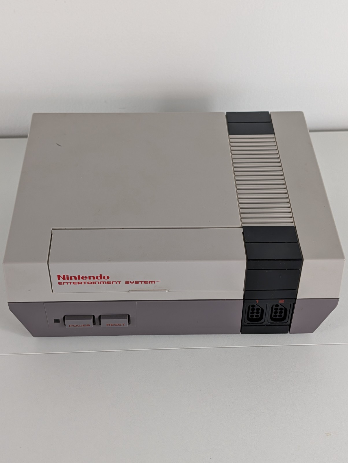 Nintendo NES Console Bundle – w/Cables, 2 OEM controllers, Game – TESTED WORKING