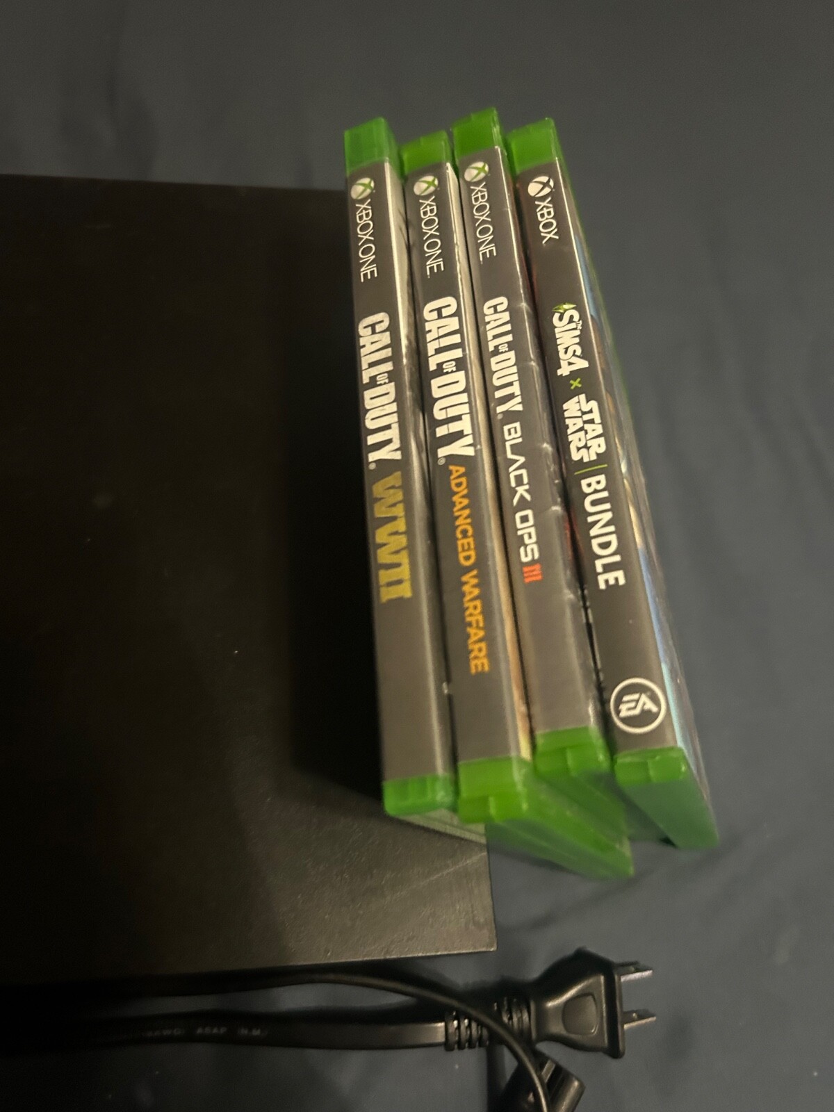 Microsoft Xbox One X 1TB Home Console – Black with 4 games