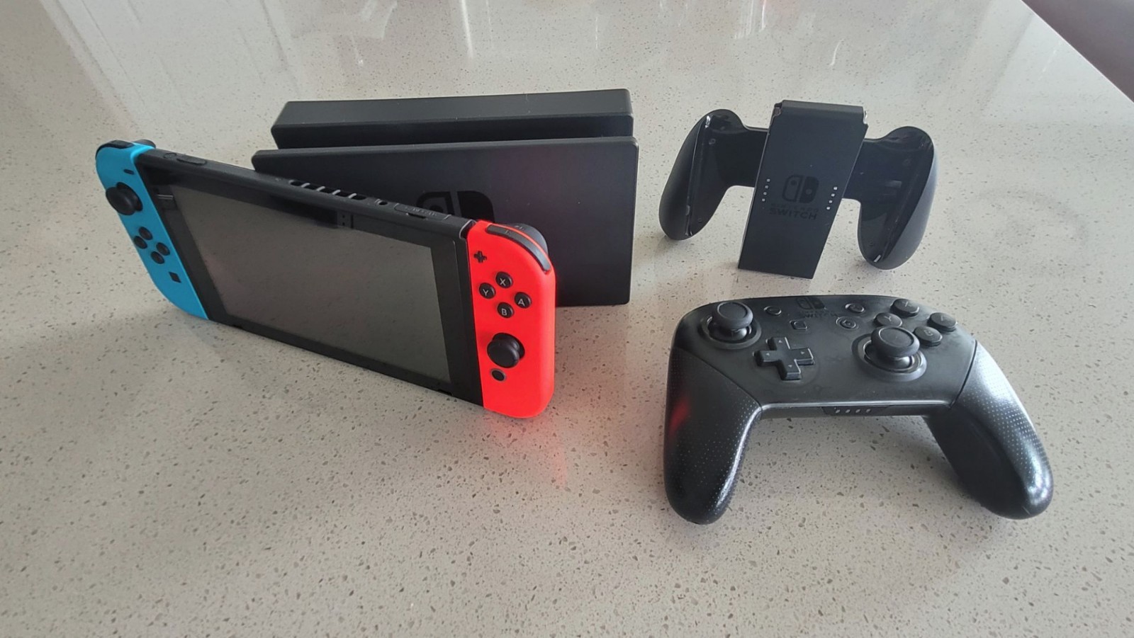 BUNDLE Switch V2, Pro Controller, SanDisk 128 MSD, AB Hardshell Case, & Adapters