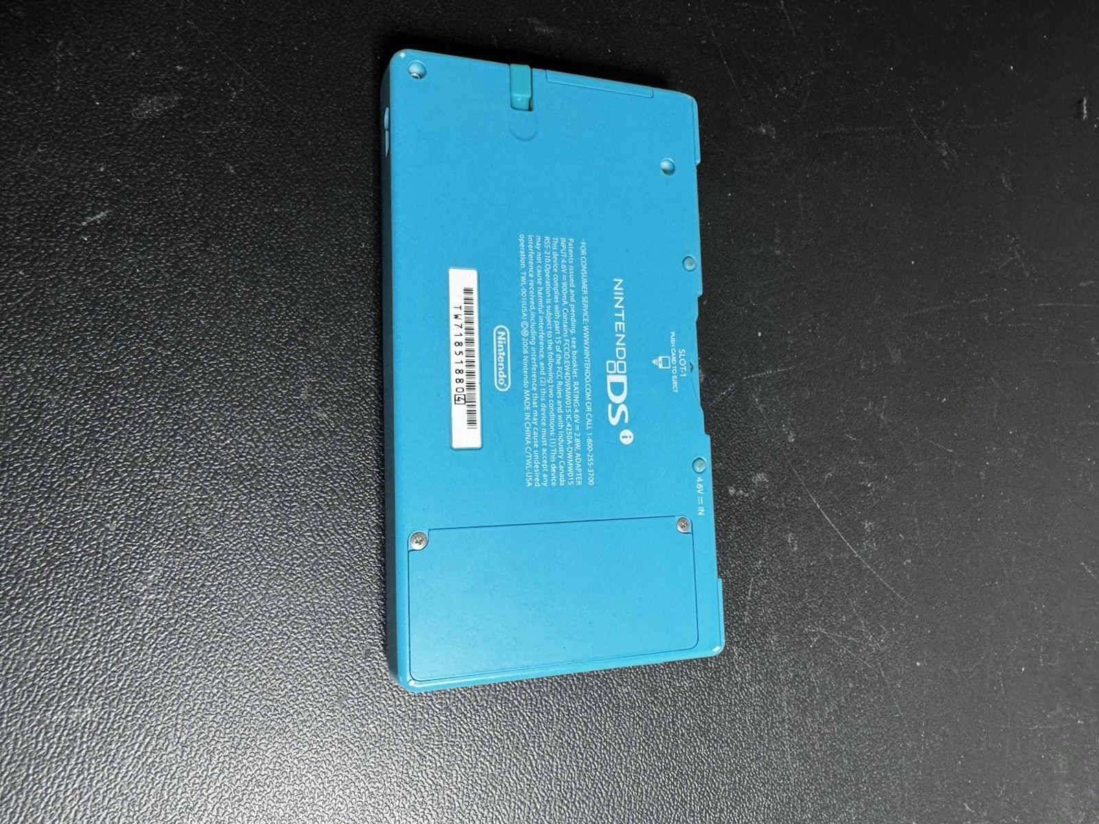 Nintendo DSi Ice Blue Handheld Console System W/ Charger & X-men Nice Condition