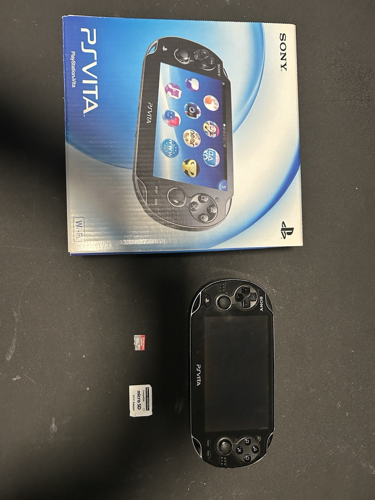 Sony PS Vita PCH-1000ZA01 Black Wi-Fi NTSC-J Handheld System Bundle