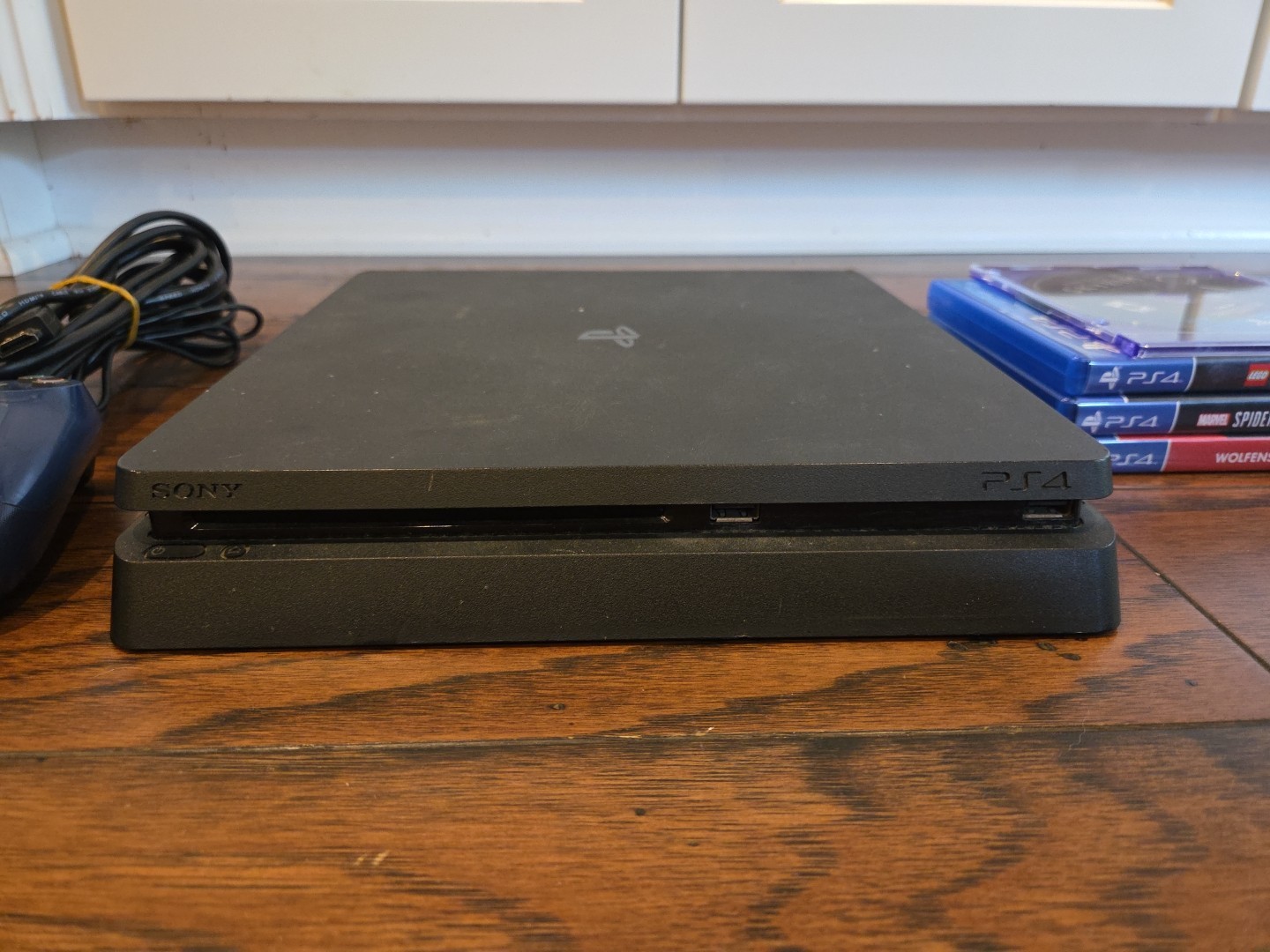 Sony PS4 Slim 1TB CUH-2115B Console + 4 Games And Controller Cords – Tested