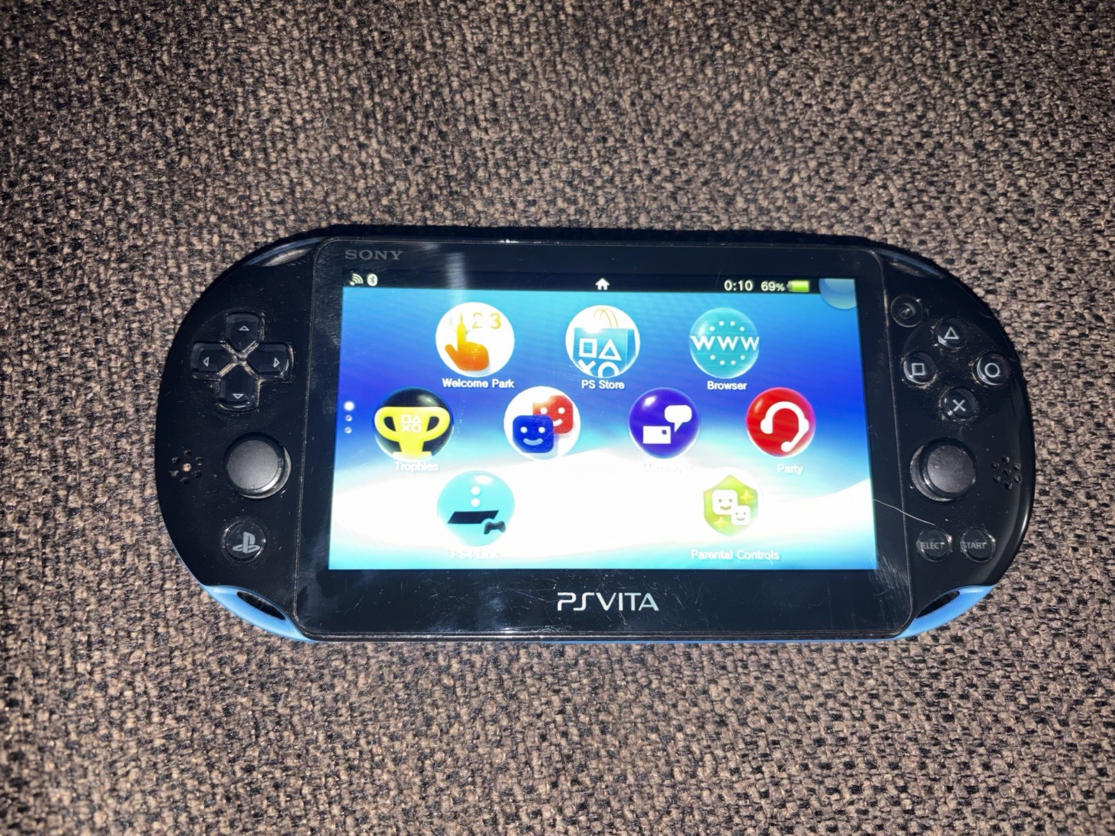 PS VITA 2000 Black and Blue Come With Charger And Works Great- Check description