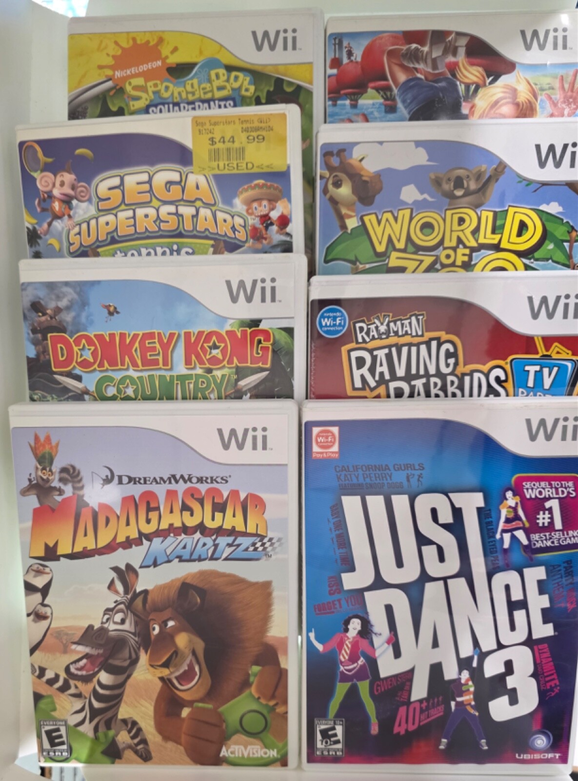 Nintendo Wii Console Bundle with 2 Controllers and Nunchucks including 8 Games