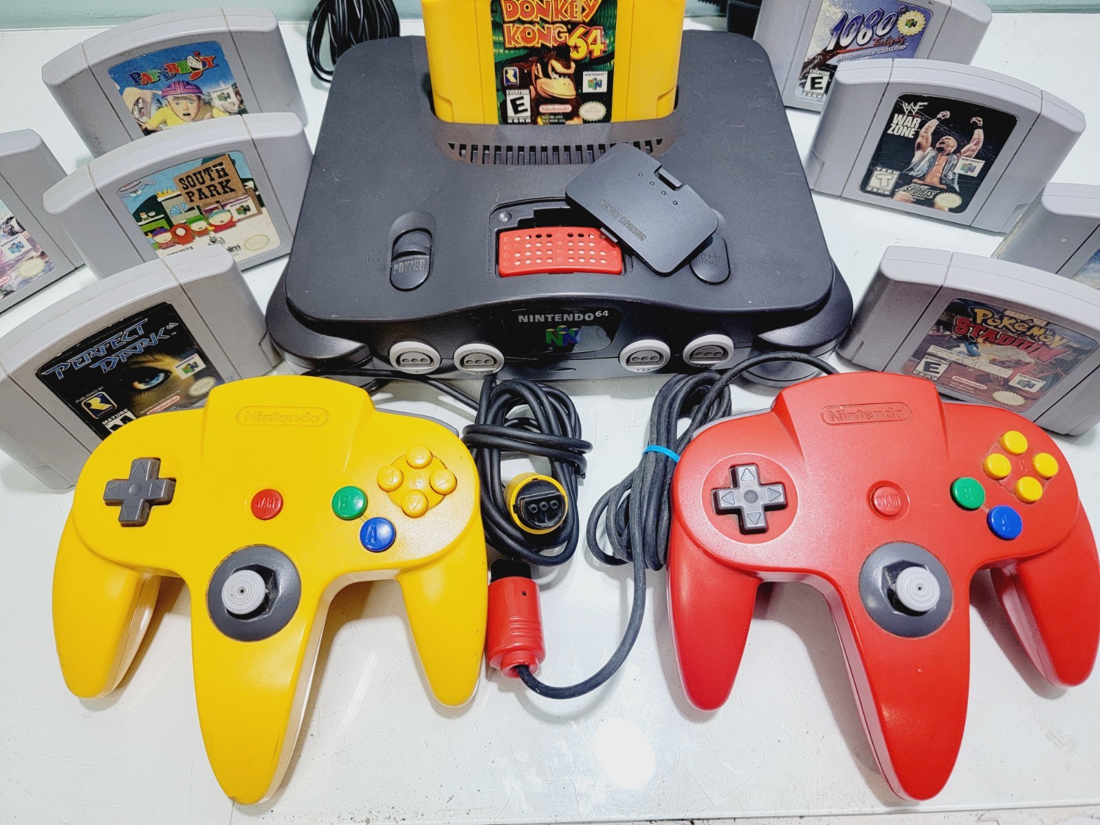 Nintendo 64 N64 Console Bundle w/ 2 Controllers & Dk + 8 Games Xpantion Pak