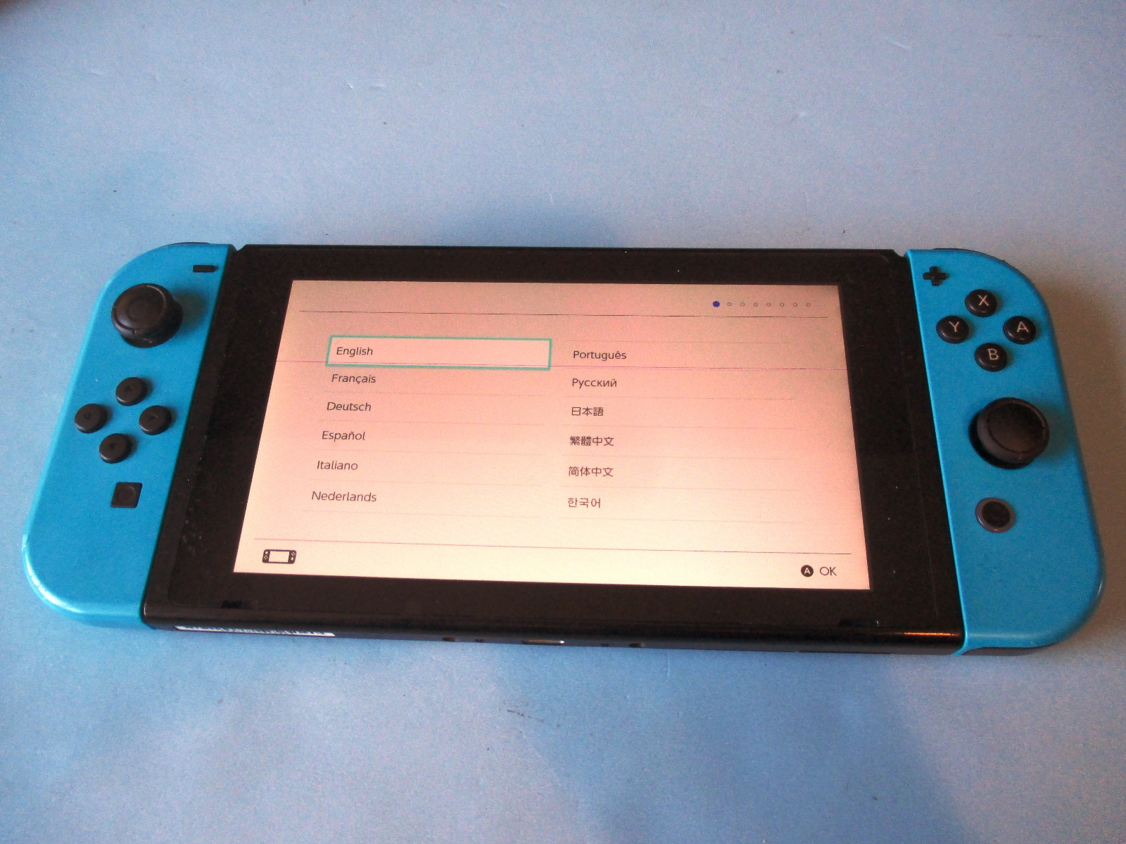 Nintendo Switch System Console w/Neon Blue Joy-Cons + Case & Charger