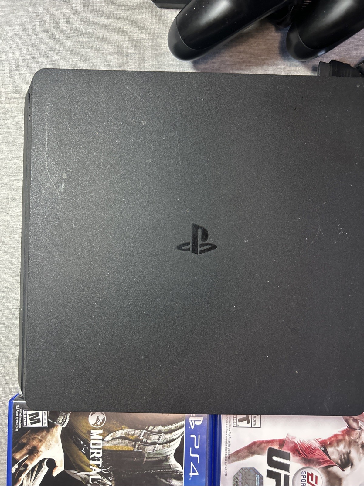 Sony PS4 Slim Black Console Bundle – 2 Controllers, 2 Games, Cables – TESTED