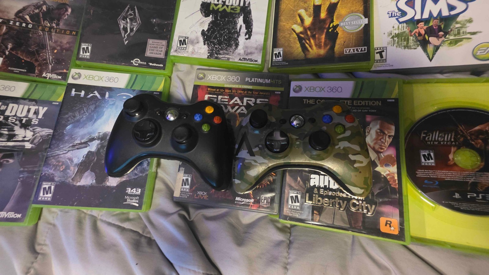 Microsoft Xbox 360 E 500GB Console with two controllers and 12 games