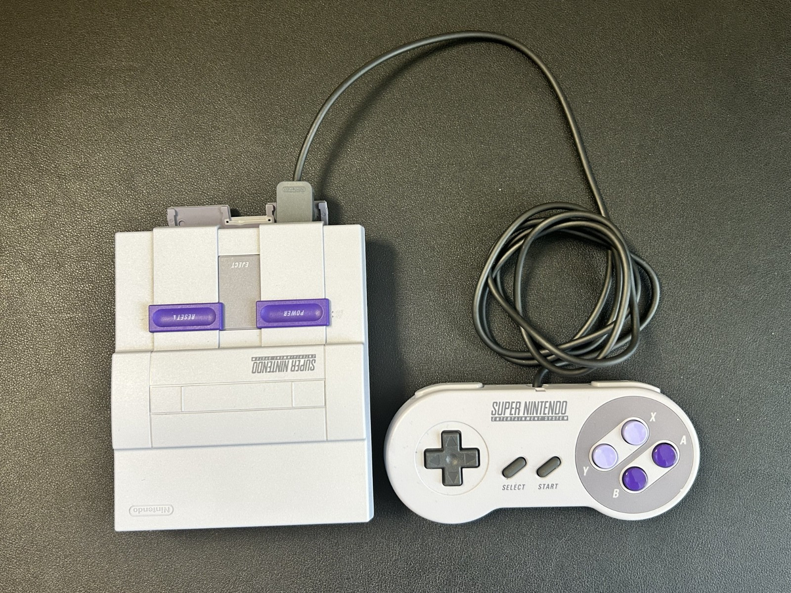 Super Nintendo Console CLV-201 with a Controller CLV-202 and power cord