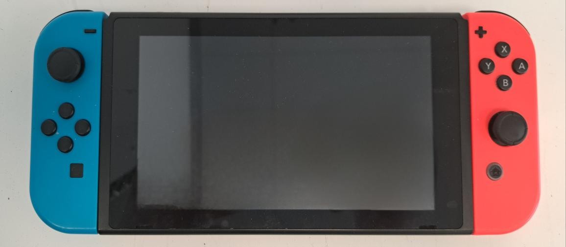 NINTENDO SWITCH W/ DOCK & CORD IN GOOD CONDITION AS PICTURED TESTED (P10023547)