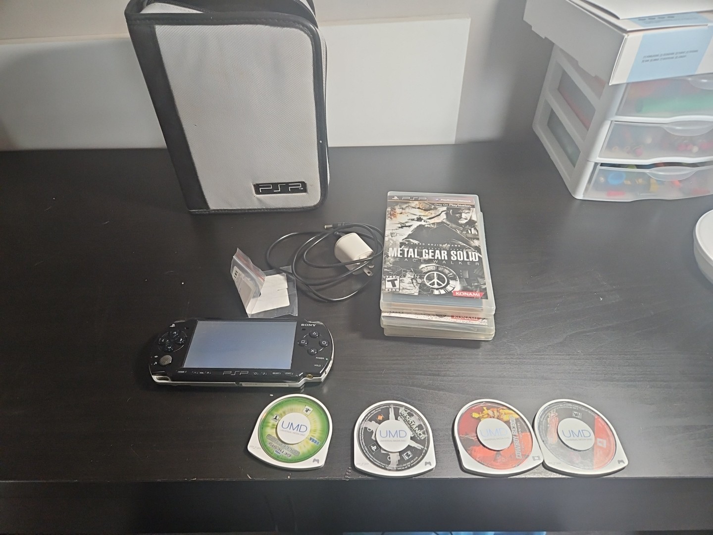 Sony PSP Go PSP-1001 PlayStation Portable – Black Bundle With Games