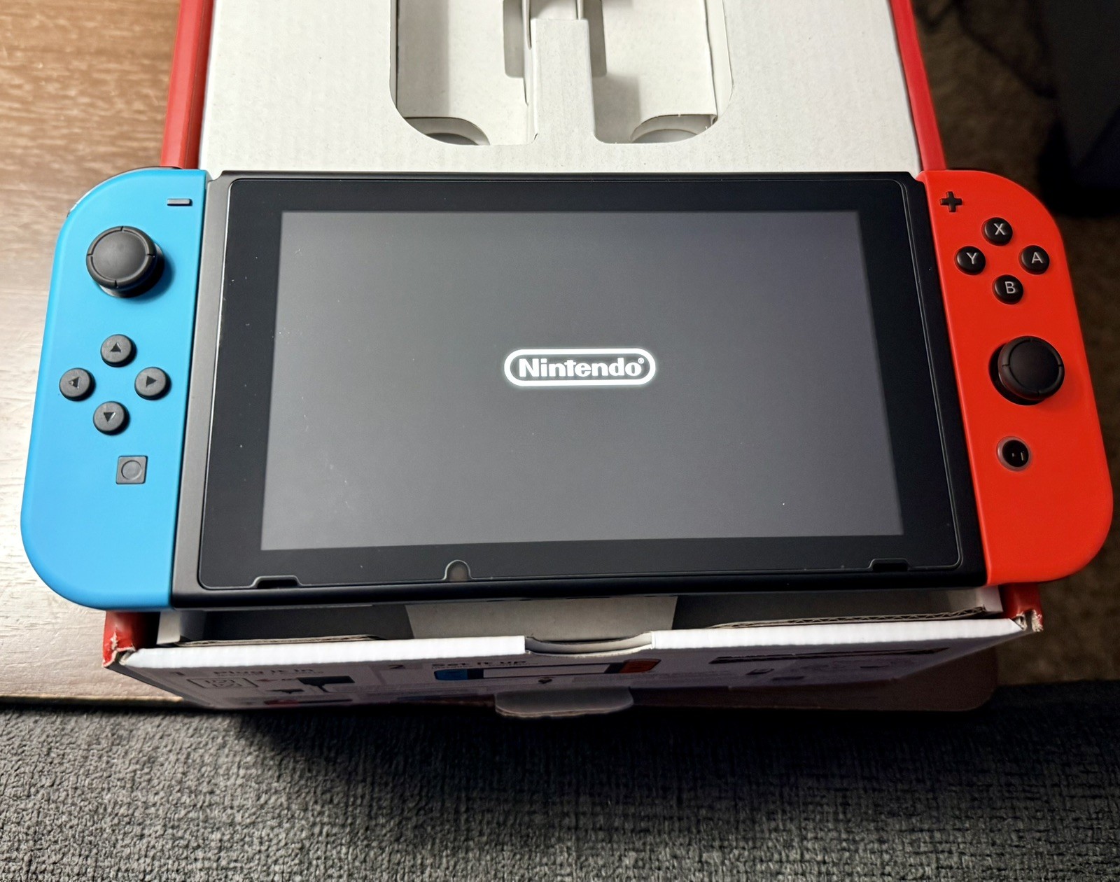 Nintendo Switch 32GB Handheld Console – Neon Red/Neon Blue