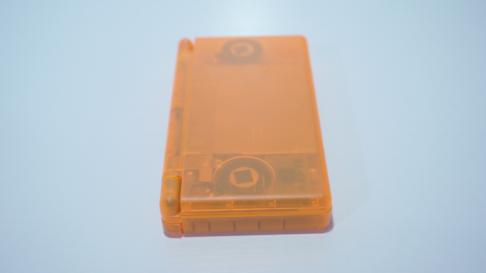 Nintendo DS Lite Transparent Clear Orange Handheld System with Charger & Stylus